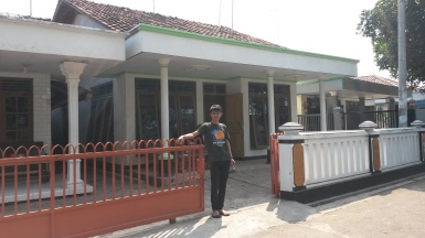 My brother in law stood in front of Bapak Tua's house (grandpa) 